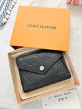 Louis Vuitton Leather Black Trifold medium Wallet
