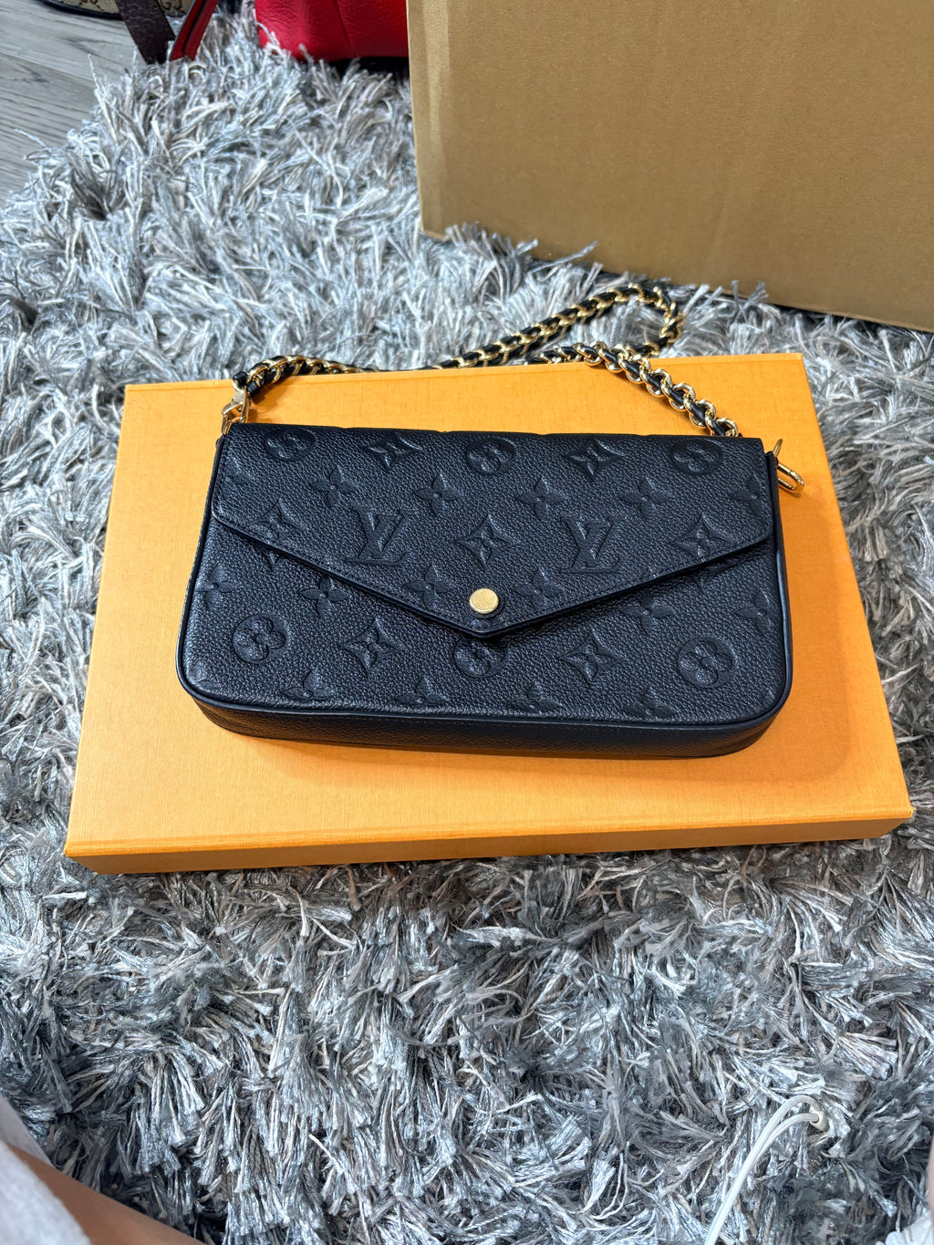 Louis Vuitton Pochette in Black Monogram Empriente Shoulder Strap